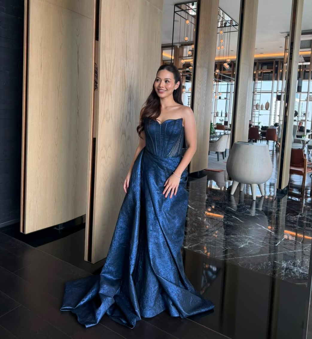 Navy satin draped evening gown by CELRA