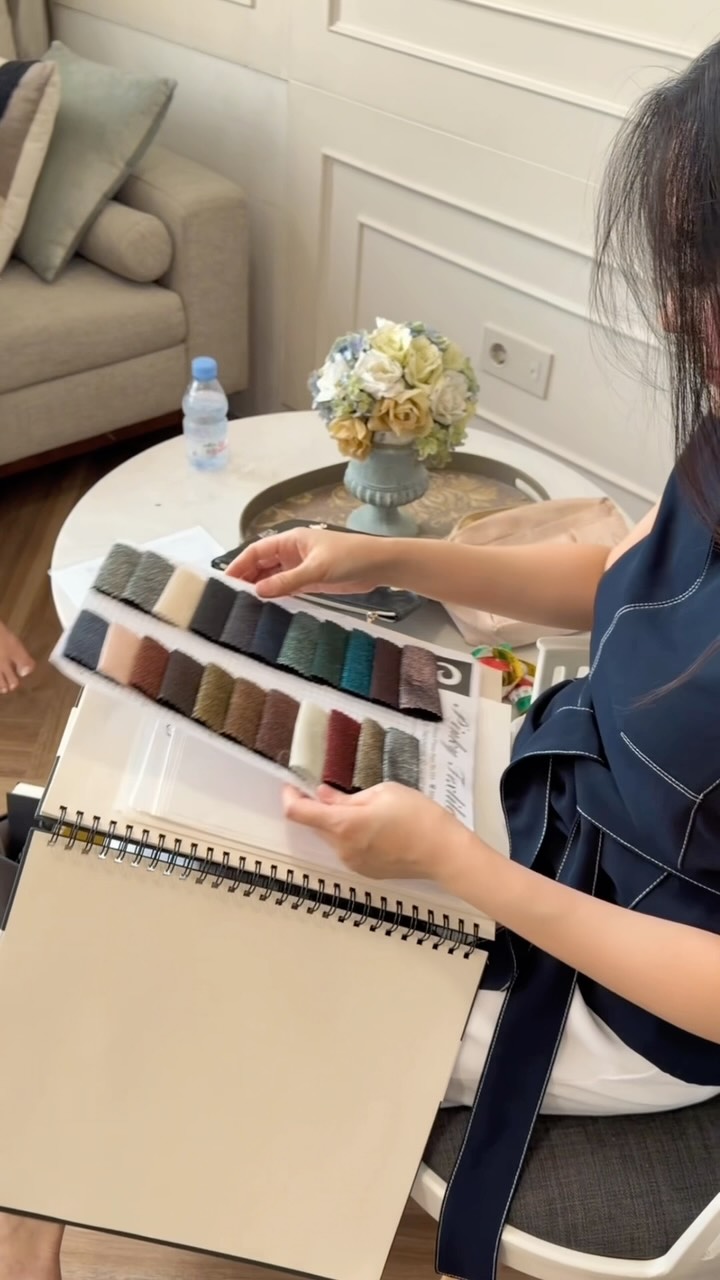 Bespoke consultation with a fabric swatch book by CELRA