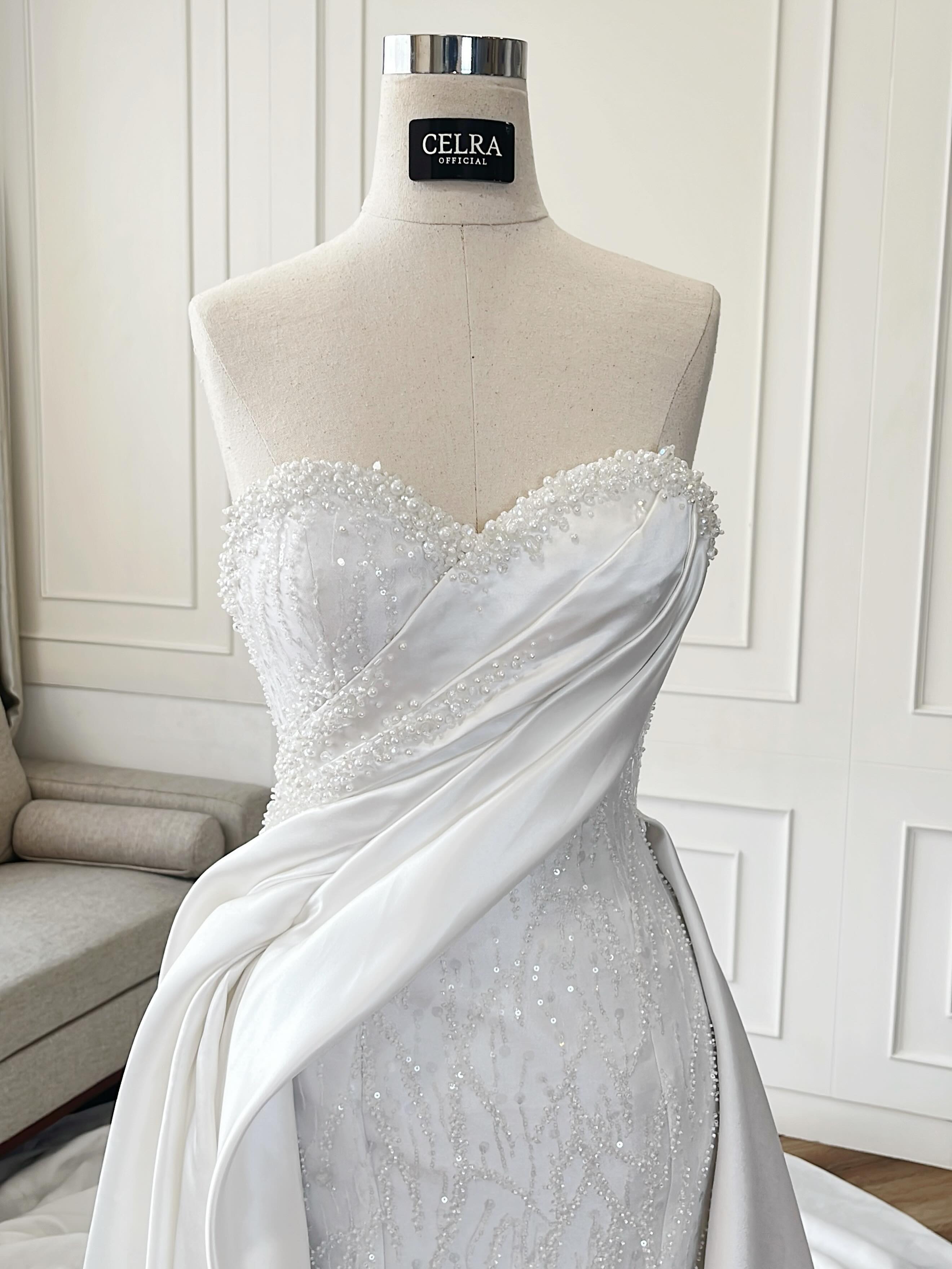 Sweetheart bodice with draped satin panel by CELRA