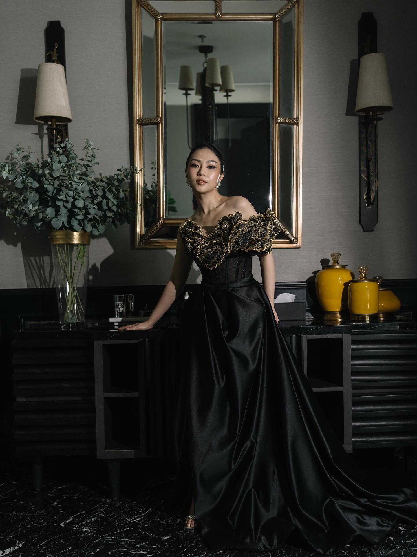 Black and gold evening gown with long satin train by CELRA