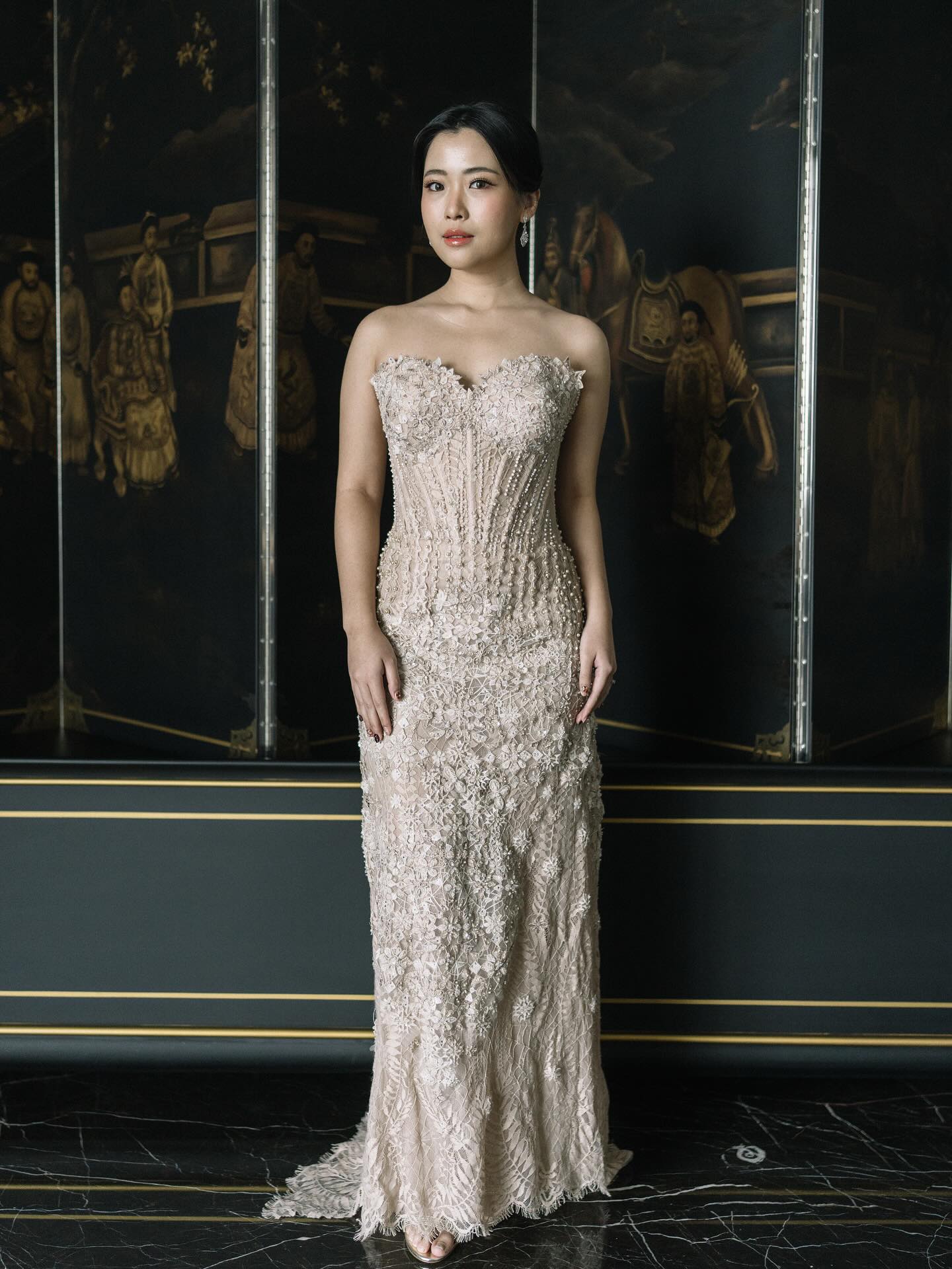 Full-length champagne lace column gown by CELRA