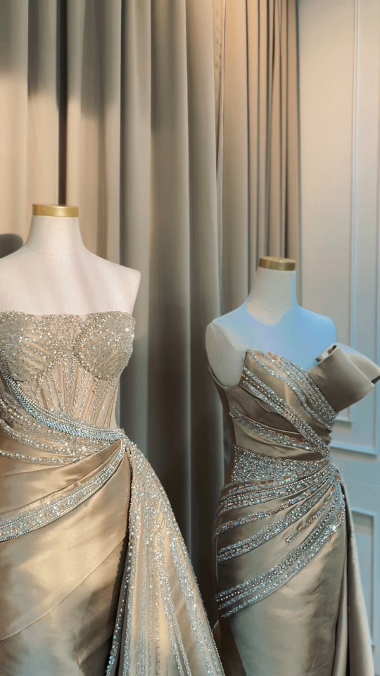 Champagne corset gowns on mannequins in the showroom by CELRA