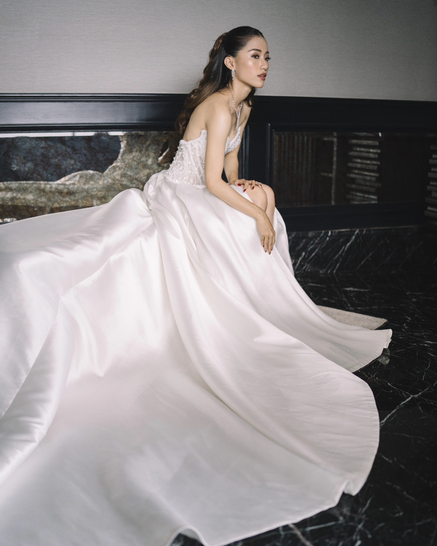 Bride twirling in a flowing white gown by CELRA