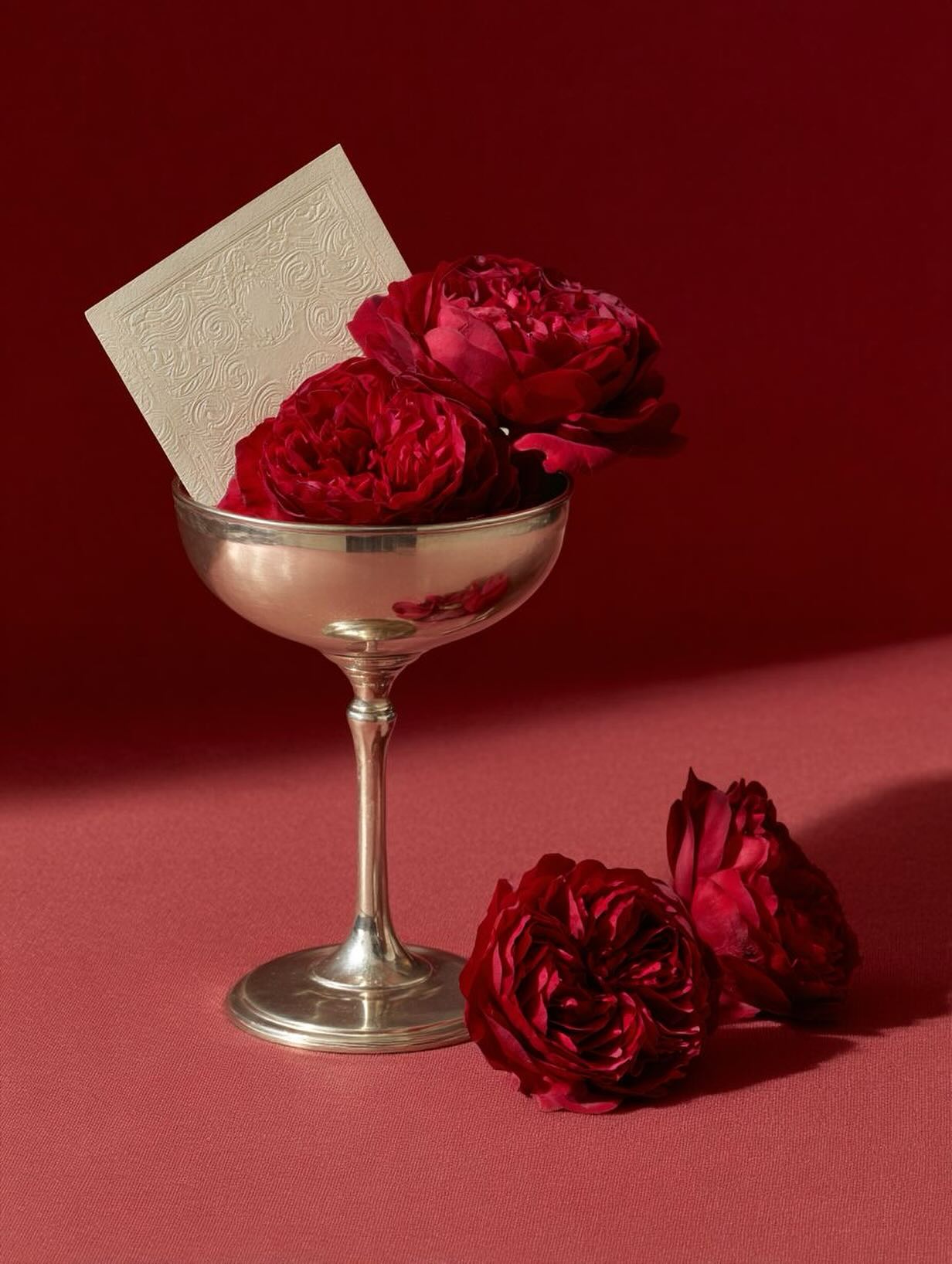 Red roses in a vintage coupe
