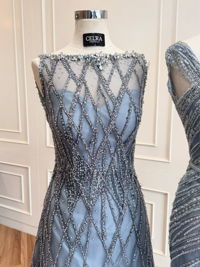 Soft blue gown with geometric beadwork — CELRA.id rental