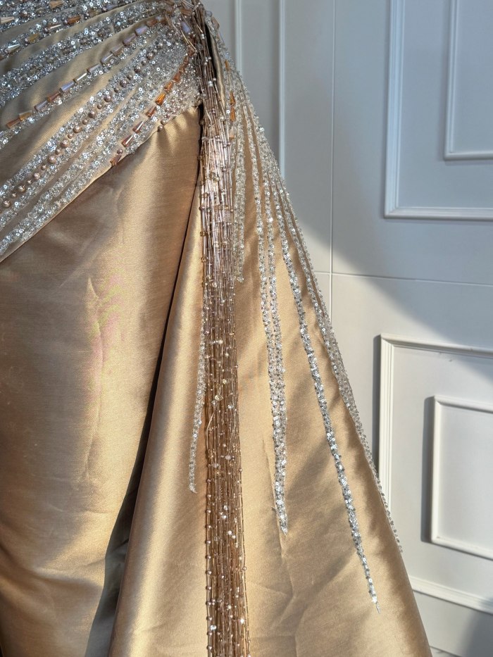 Gold satin gown with draped train — CELRA.id rental